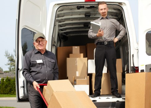 Staff and customers following safe storage procedures in a secure facility