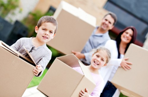 Moving van and packing boxes outside a central London property