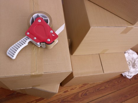 Professional movers handling a flat relocation with care in Westminster